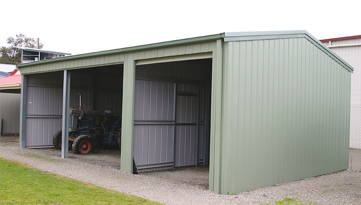 Internal shed wall creating one large open bay and one smaller bay