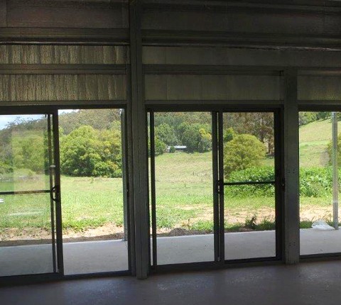 Sliding doors seen from the inside of a shed