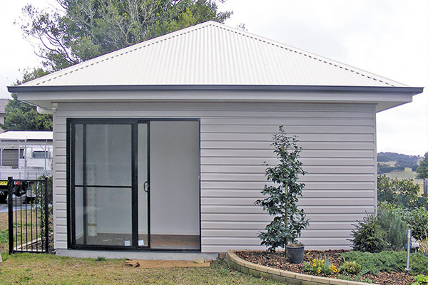 Smaller livable shed with sliding glass door